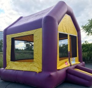 big purple and yellow bounce house